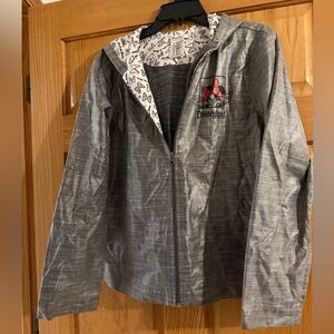 Disney Resorts Minnie Mouse glittery bows rain jacket women’s size large